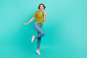 Full length portrait of overjoyed astonished person empty space ad isolated on turquoise color background