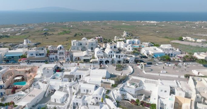 White-washed beauty, blue domes, seen from above.