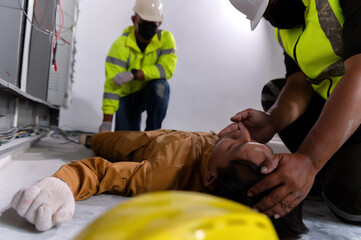 Establish an airway, Life-saving and rescue methods. Accident at work of electrician job or Maintenance worker in the control room of factory.