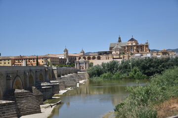 Panoramic from the Roman bridge to the Andalusian city of Cordoba in Spain
