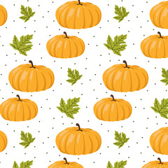 A seamless pattern with big yellow pumpkins and green maple leaves with dots on white background for banner, wallpapers, fabrics, packaging