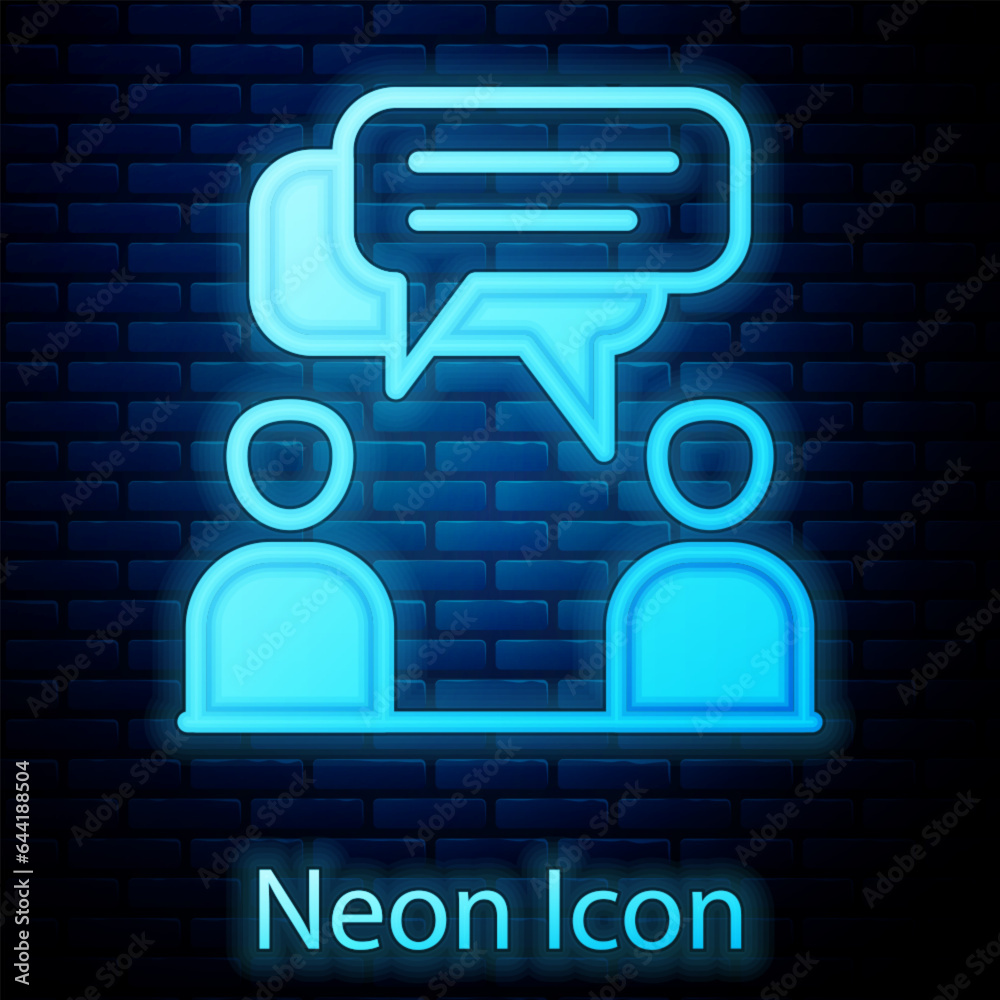 Wall mural glowing neon two sitting men talking icon isolated on brick wall background. speech bubble chat. mes