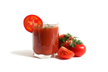  On a white background is a glass of tomato juice with tomatoes and herbs.
