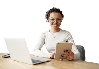 Uses a tablet and a laptop computer, a student young woman laughs working online. An office employee, a young entrepreneur in the office.