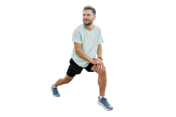 A trainer performing fitness exercises. Athletic man training jogging full-length. Healthy lifestyle, sports clothes for running and sneakers.