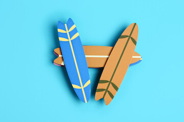 Different mini surfboards on blue background