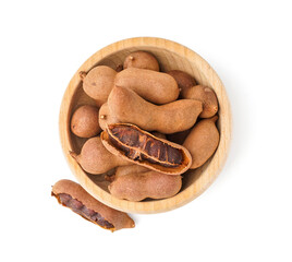 Bowl of tasty tamarinds on white background