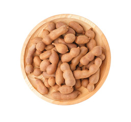 Plate of tasty tamarinds on white background