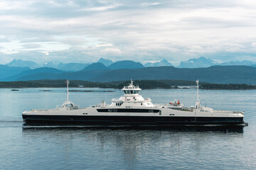 Ferry on the North Sea in the fjord. Norway landscape. Transportation subject.