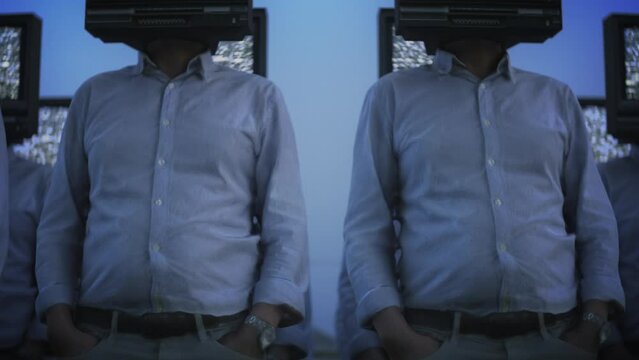 Brainwashed. Surreal army of tv head people standing in line. Media manipulation concept. Totalitarian controlled society symbol. Scary future sci-fi video loop. Total invigilation, fake news.