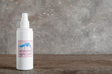 Mosquito repellent spray on table