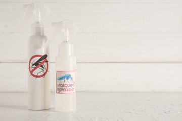 Mosquito repellent sprays on table