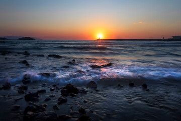 Sunset and sea view. Photo taken with the long exposure technique. Turkey Kusadası Beach.  