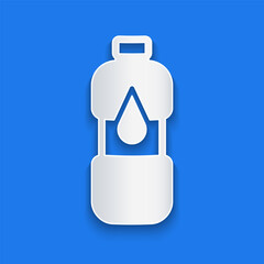 Paper cut Bottle of water icon isolated on blue background. Soda aqua drink sign. Paper art style. Vector