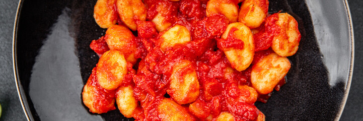 gnocchi delicious potato dish tomato sauce no meat ready meal appetizer meal food snack on the table copy space food background rustic top view vegetarian vegan food  