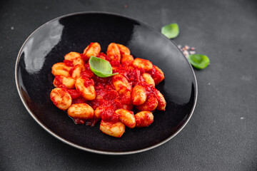 gnocchi delicious potato dish tomato sauce no meat ready meal appetizer meal food snack on the table copy space food background rustic top view vegetarian vegan food  