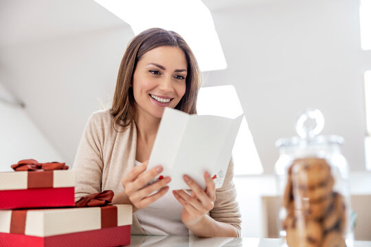 Woman looking at christmas letter