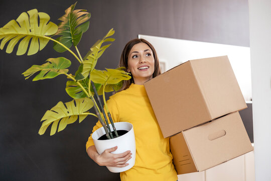 Woman moving into new apartment