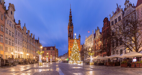 Decorated Christmas tree in festive illuminations at the Long Market in Gdansk at blue hour. Poland.