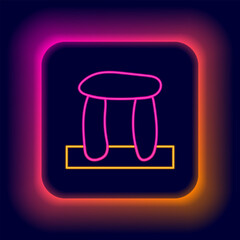 Fototapeta na wymiar Glowing neon line Stonehenge icon isolated on black background. Colorful outline concept. Vector