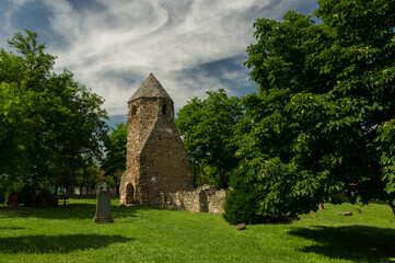 Ancient basalt tower of Avas church ruin at Szigliget near Lake Balaton, Hungary