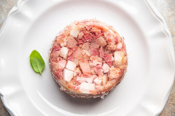 meat brawn food Sülze piece of meat in jelly pork, beef meat ready to eat meal food snack on the table copy space food background rustic top view
