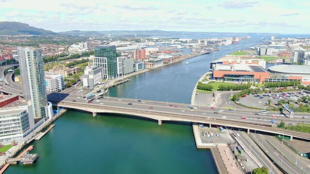 Aerial view on buildings and Lagan River in City center of Belfast Northern Ireland. Drone photo, high angle view of town