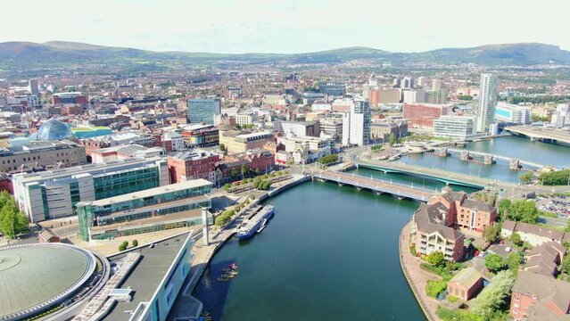 Aerial view on buildings and Lagan River in City center of Belfast Northern Ireland. Drone photo, high angle view of town