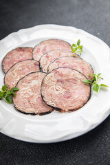 offal meat sausage pork Andouille pork stomach, pork neck, offal meal food snack on the table copy space food background rustic top view