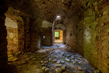 Vaulted red brick dungeon under old mansion. Former estate of the Golitsyns in Zubrilovka