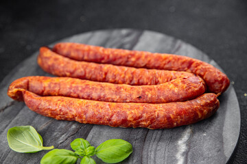 sausage meat pork, beef, lamb or chicken fresh appetizer meal food snack on the table copy space food background rustic top view