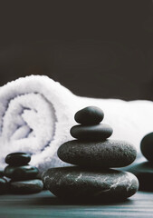 stack of massage stones and towels. AI generative