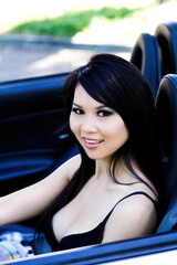 Asian American Sitting In Car Smiling In Black Bra