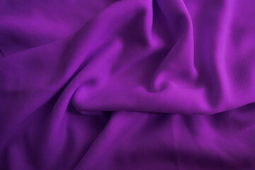 Purple fabric background. Abstract purple wavy cloth.