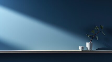 An image of soft light gently illuminating a dark blue wall.