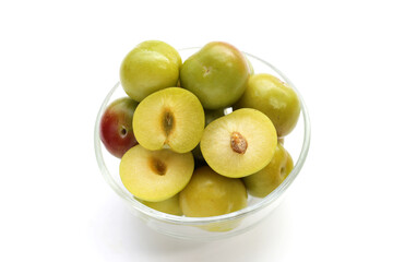 Fresh green plum fruit on white background.