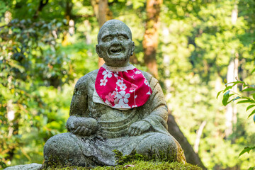 Jizo statuary is a stone guardian statue according to Japanese beliefs.in the Park of Japan temple.