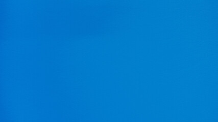 Bright blue artificial leather background, bright blue leather texture