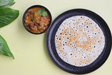 Set dosa served with black chana curry or sponge dosa, thick fluffy and soft made with rice, urad dal, fenugreek seeds and poha, south Indian food