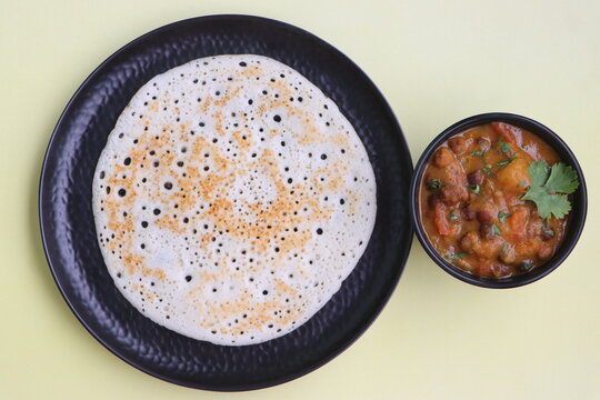 Set dosa served with black chana curry or sponge dosa, thick fluffy and soft made with rice, urad dal, fenugreek seeds and poha, south Indian food