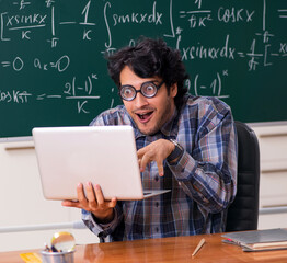 Fototapeta Funny male math teacher in the classroom obraz