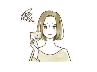 マイナンバーカードを持って困っている女性