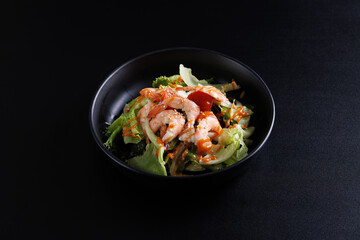 Japanese salad isolated in black background