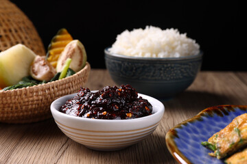 pork shrimp chilli dip local thai food sauce isolated in wood background