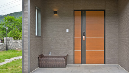 Entrance entrance of a luxury home finished with ceramic siding