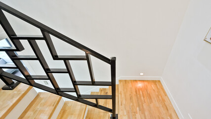 The staircase handrail was made with a black steel frame to promote peace of mind