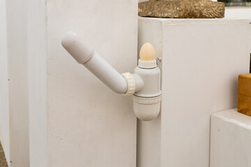 Plastic exhibit made from plumbing made by a local artist in the famous artists village Ein Hod near Haifa in northern Israel