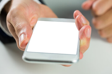 Digital png photo of businessman holding smartphone with copy space on transparent background