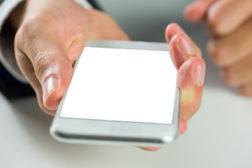 Digital png photo of businessman holding smartphone with copy space on transparent background