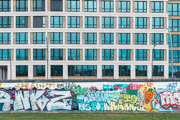 Berlin, Germany: April 21, 2022: Art and drawings on the Berlin wall.